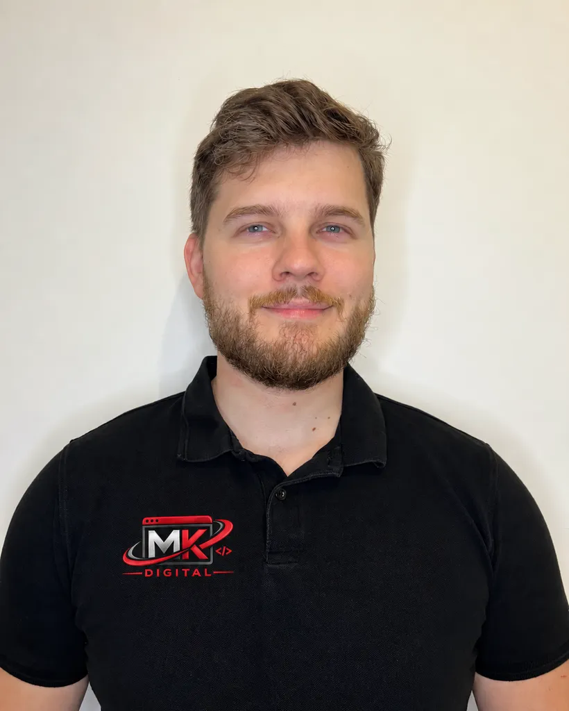 Martin Kaminski, founder of MartKam Digital, wearing a MartKam Digital polo shirt
